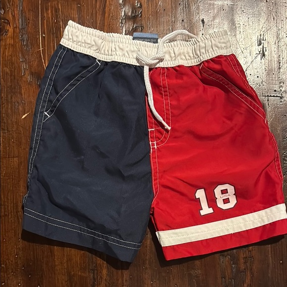 CHILDRENS PLACE BOYS RED BLUE BATHING SWIM SUIT SUMMER POOL SHORTS SZ 12 MONTHS - Picture 1 of 3